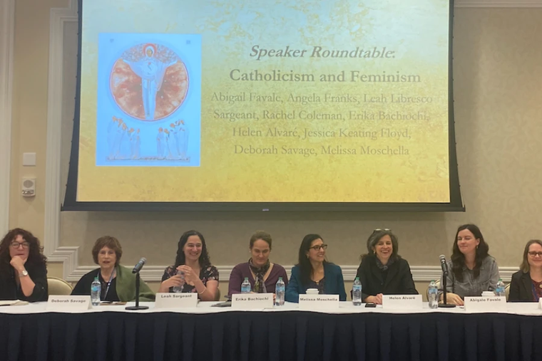 Panelists discuss the connection between Catholicism and feminism at a recent Notre Dame conference. From left to right, Rachel Coleman, Deborah Savage, Leah Libresco Sargeant, Erika Bachiochi, Melissa Moschella, Helen Alvare, Abigail Favale and Angela Franks.