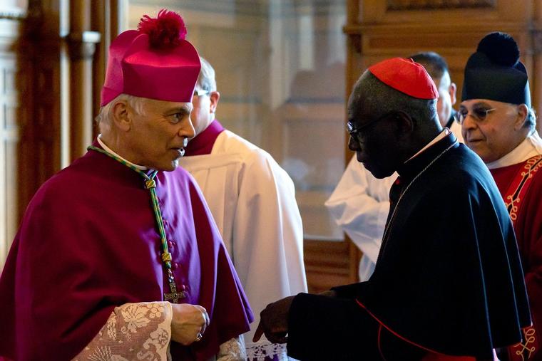 San Francisco Archbishop Salvatore Cordileone (l) speaks with Cardinal Robert Sarah, prefect emeritus of the Congregation for Divine Worship and the Discipline of the Sacraments