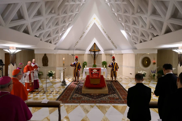 The body of Pope Francis lies in state at the Vatican's Domus Sanctae Marthae chapel, surrounded by Swiss Guards, cardinals, and Vatican officials paying their respects before his transfer to St. Peter's Basilica for public veneration on April 22, 2025. The mortal remains of Pope Francis will be transferred to St. Peter's Basilica on Wednesday, April 23.
