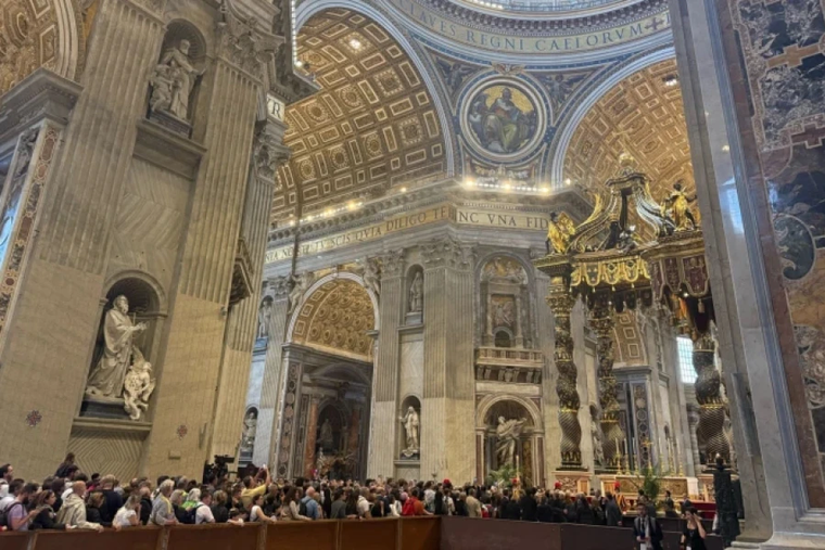 Pilgrims line up inside the St. Peter’s Basilica to see Pope Francis lying in state.