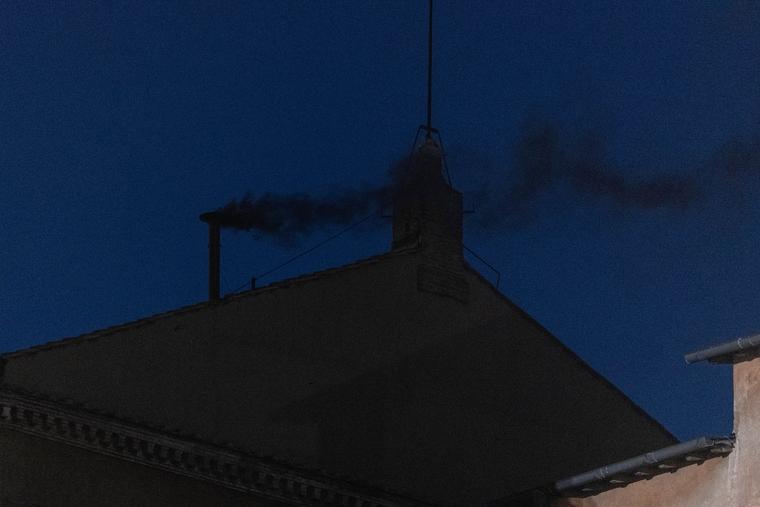 Black smoke billows from the chimney of the Sistine Chapel, where 133 cardinals are gathering on the first day of the conclave, indicating that a successor of late Pope Francis was not elected, Wednesday, May 7, 2025.
