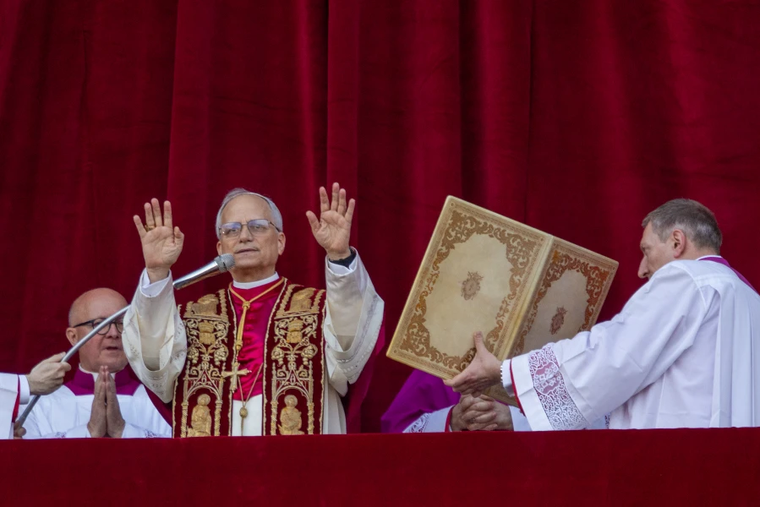 Pope Leo XIV greets the faithful in St. Peter’s Square shortly after his election to the papacy, Thursday, May 8, 2025.