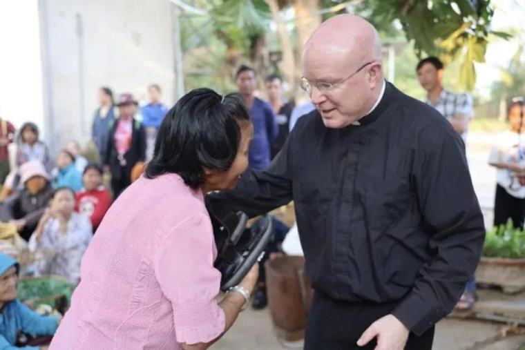 At a leper colony in the Kon Tum area in Vietnam in April 2025, Pontifical Missions Society USA President Monsignor Roger Landry celebrated Mass, brought Communion to people, and distributed food and sandals.
