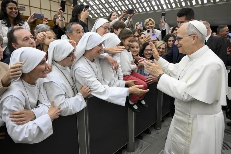 Pope Leo XIV greets the faithful May 24, 2025, during an audience with officials of the Roman Curia and employees of the Holy See, of the Governorate of Vatican City State and of the Vicariate of Rome, and their families.