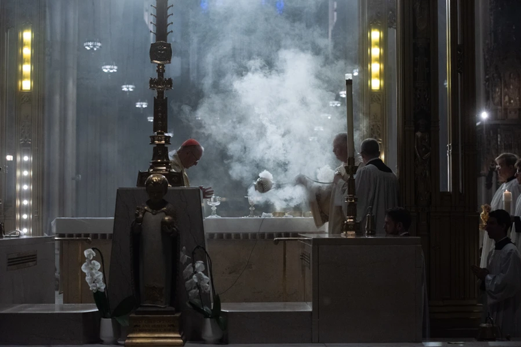 Cardinal Timothy Dolan stands at the altar during Mass at St. Patrick's Cathedral in New York City on May 26, 2024.
