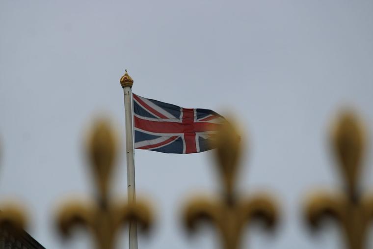 The flag of the U.K. flies at Buckingham Palace, London.