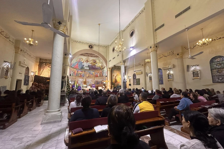Holy Mass at the Holy Family Parish in Gaza, led by the parish priest, Father Gabriel Romanelli during the Advent season, December 2024.