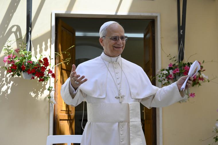 Pope Leo smiles as he arrives for a visit to the Santa Marta Retirement Home in Castel Gandolfo, Italy, on July 21, 2015.