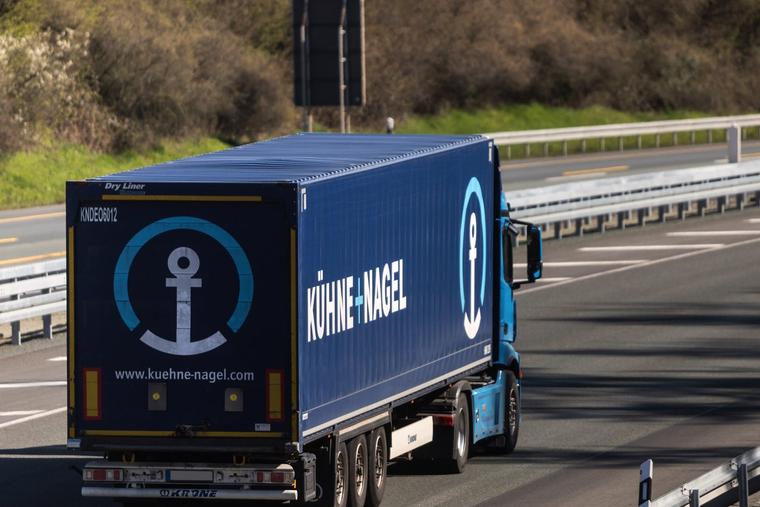 A Kühne + Nagel truck travels along a German highway. The company operates the Belgian warehouse at the center of the USAID contraception controversy.