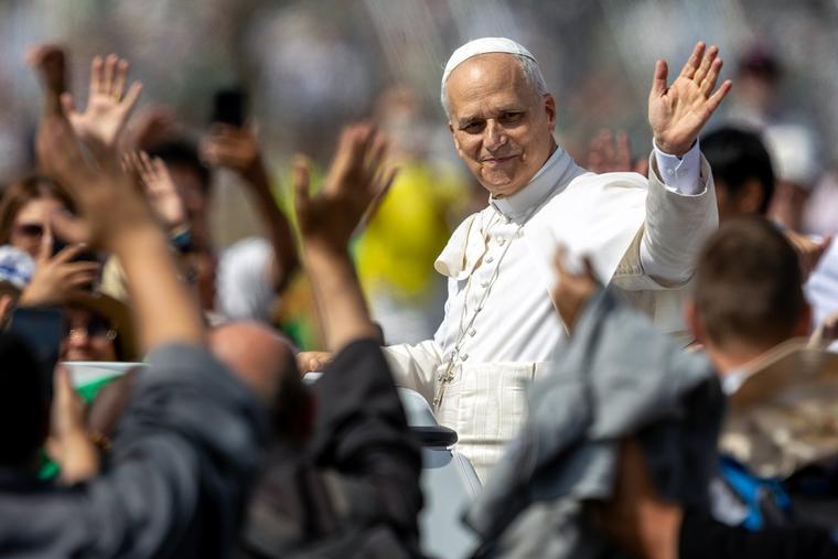 Pope Leo XIV is greeted by a vast crowd of young people Sunday at the University of Rome Tor Vergata.