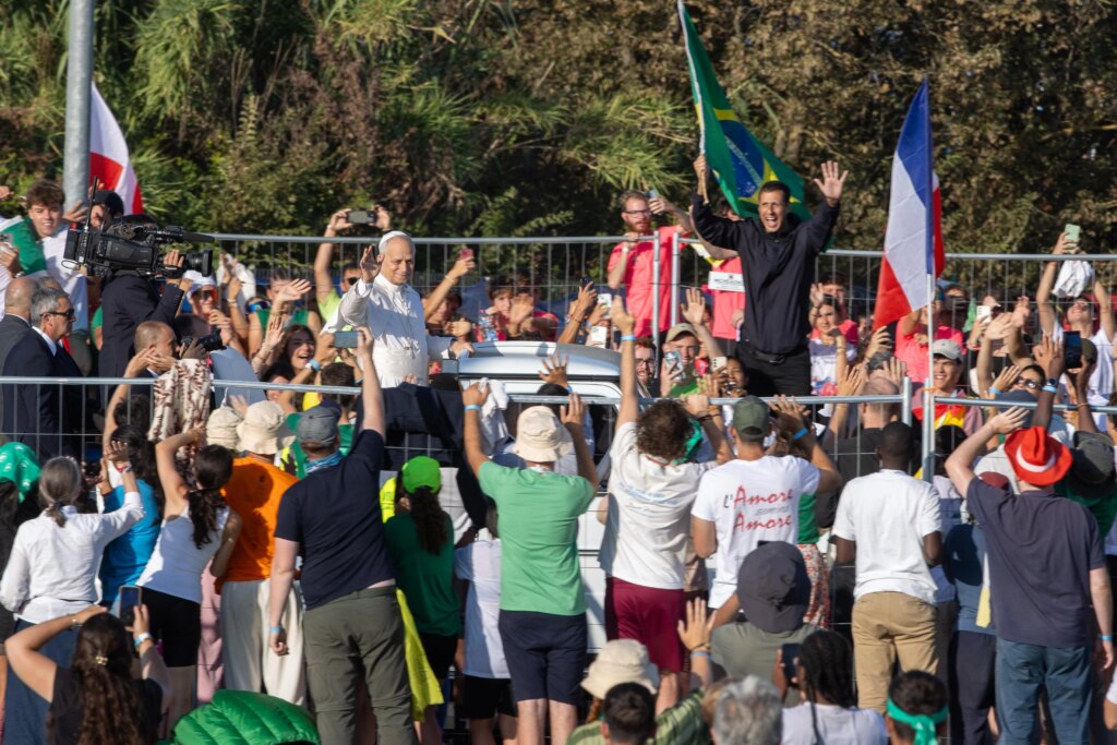Pope Leo XIV was greeted by enthusiastic crowds of young people as he rode around in a papal car before Mass for the Jubilee of Youth at the University of Rome Tor Vergata on Aug. 3, 2025. Credit: Daniel Ibanez/CNA