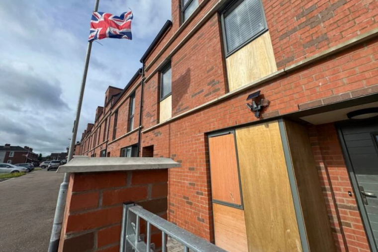 A view of damaged houses in the Annalee Street area of North Belfast, Northern Ireland. A spokesman for the Diocese of Down and Connor strongly condemned intimidation and attacks on Catholic families there that have led all families but one to flee their homes. The families were living in a housing development bordering a predominantly loyalist district in the north of the city.