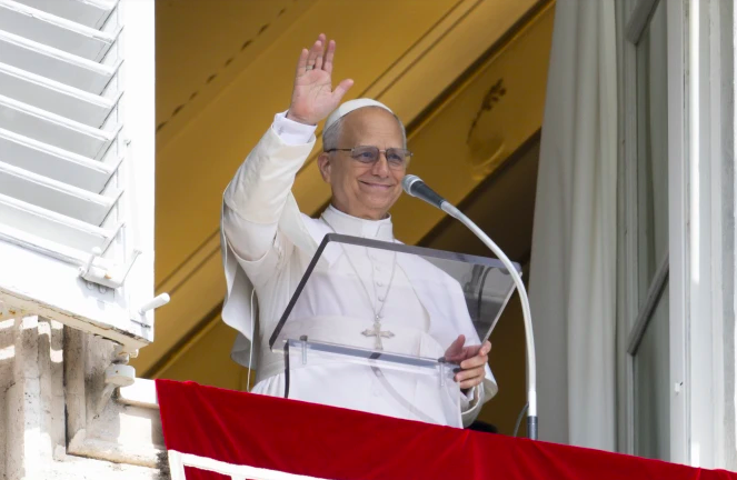 Pope Leo XIV, at a window of the Vatican's Apostolic Palace, leads pilgrims in reciting the Angelus on Sept. 14, 2025, the Pope's 70th birthday.
