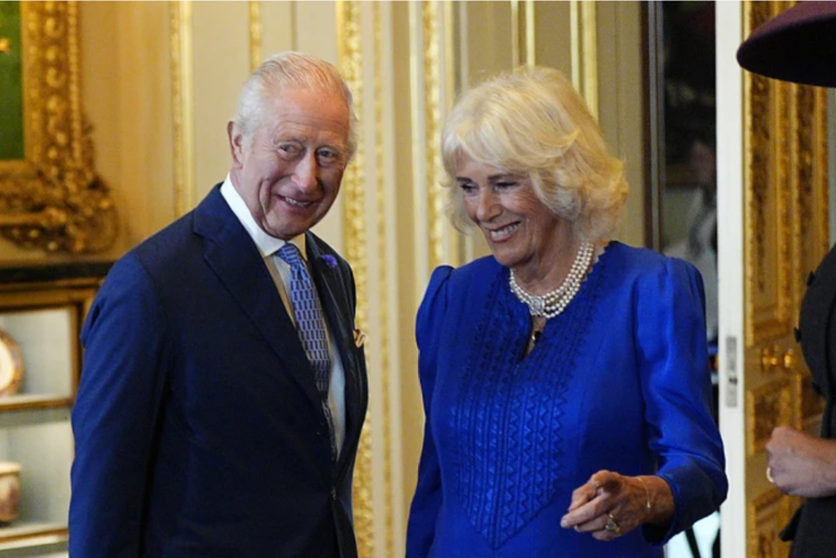 King Charles III and Queen Camilla view items on display during a visit to the Royal Collection exhibition in the Green Drawing Room during the state visit by the president of the United States of America at Windsor Castle on Sept. 17, 2025, in Windsor, England. The royal couple have announced a state visit to the Vatican in late October 2025.