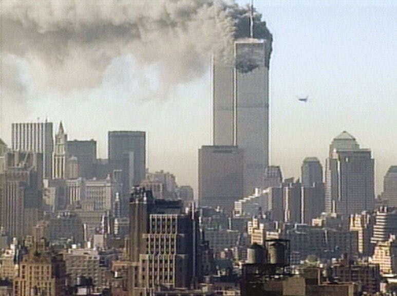 NEW YORK - SEPTEMBER 11: (JAPAN OUT) (VIDEO CAPTURE) (Series 1/4) Hijacked United Airlines flight 175 flies towards the south tower of the World Trade Center on September 11, 2001 in New York City. The plane is one of four hijacked that morning and is the second plane to be flown into the World Trade Center buildings. (Photo by CNN via Getty Images)