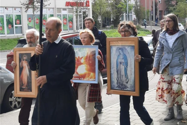 Pro-life advocates participate in a prayer procession in Regensburg, Germany.