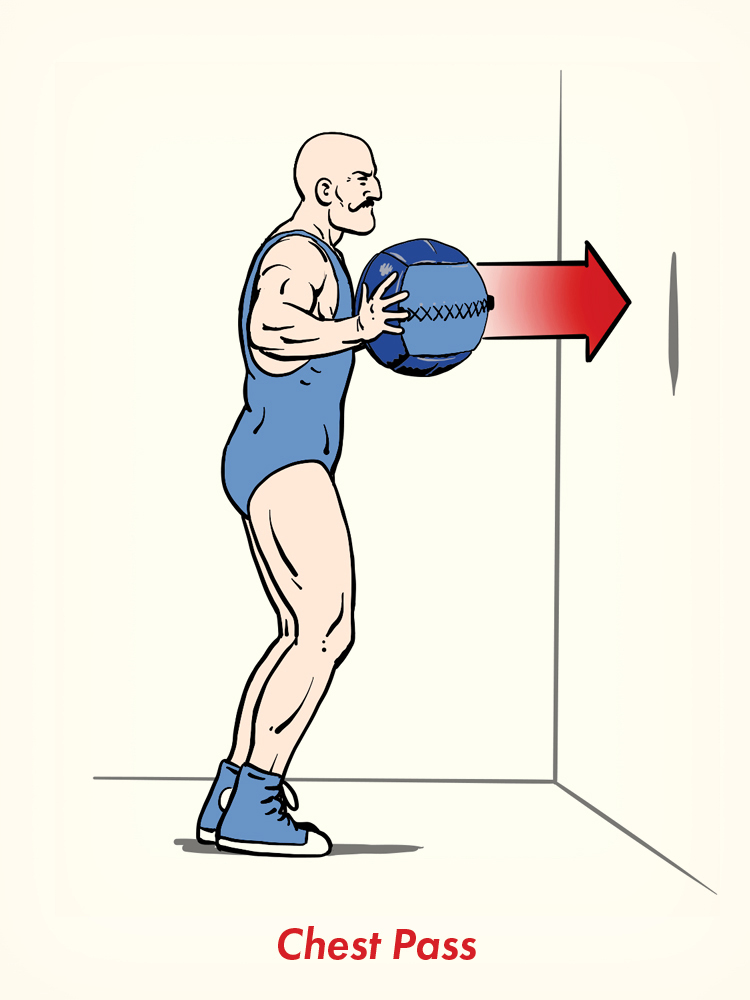 A person in athletic attire performs a chest pass, one of the classic medicine ball exercises, by pushing a medicine ball from chest height toward a wall.