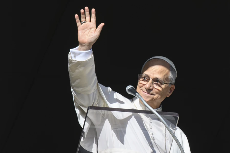 Pope Leo XIV greets pilgrims gathered in St. Peter’s Square at the Vatican for the recitation of the Angelus on Dec. 28, 2025.