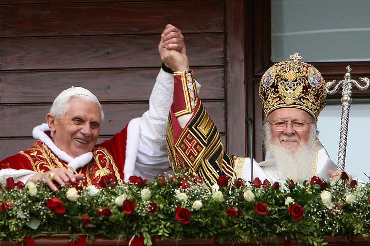 Pope Benedict XVI and Ecumencial Orthodox Patriarch Bartholomew I raise their clasped hands at the balcony of the Patriarcal Church of St. George, Nov. 30, 2006, in Istanbul.