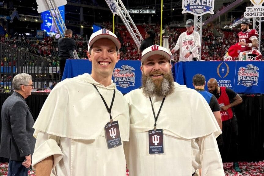 Behind The Bond Between A Heisman-Winning Quarterback And His Catholic Priest