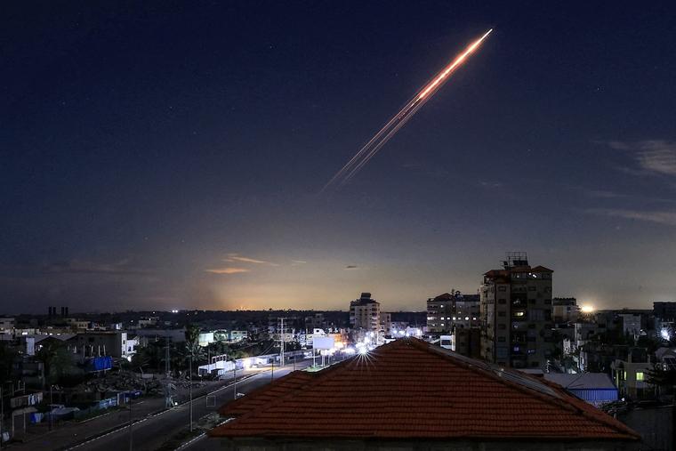 A missile launched from Iran is pictured in the sky from the Bureij camp for Palestinian refugees in the central Gaza Strip on March 1, 2026. The United States and Israel launched strikes against Iran on Feb. 28, killing Iran's supreme leader and top military leaders, prompting authorities to retaliate with strikes on Israel and U.S. bases across the Gulf.