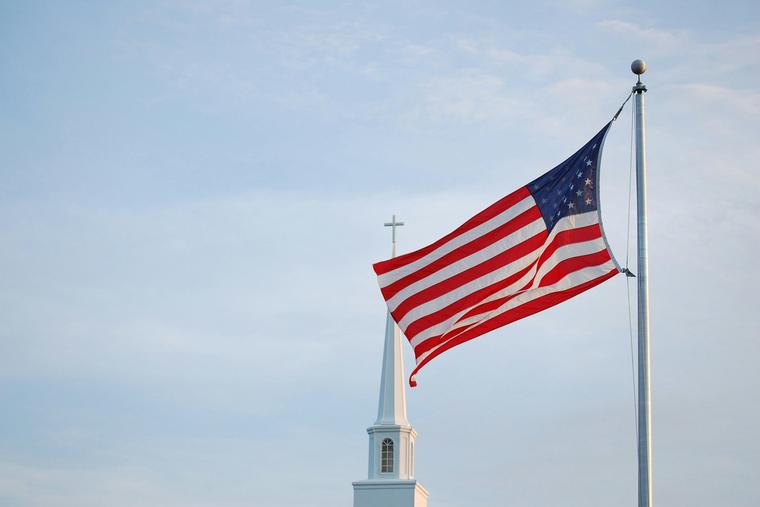 Church steeple and American flag