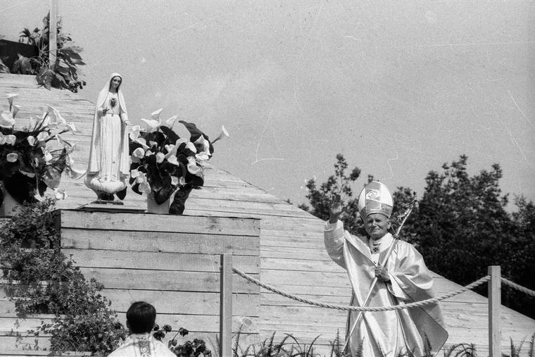 John Paul II greets the faithful at a Mass for families at Jasne Blonie (Light Meadows) in Szczecin, Poland, on June 11, 1987, during his third pilgrimage to Poland. At the Mass, John Paul II crowned a statue of Our Lady of Fatima, a gift from the Marian movement from the U.S. and France.
