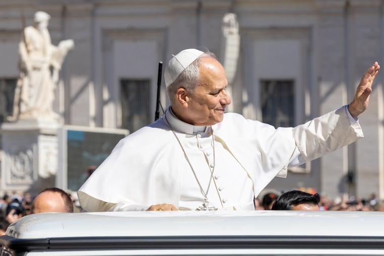 Pope Leo XIV greets people in St. Peter’s Square before his general audience on Wednesday, May 20, 2026.