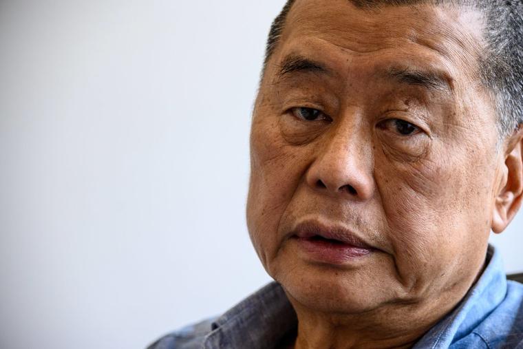 In this photo taken on June 16, 2020, Hong Kong pro-democracy media mogul Jimmy Lai poses at the Next Digital offices in Hong Kong.