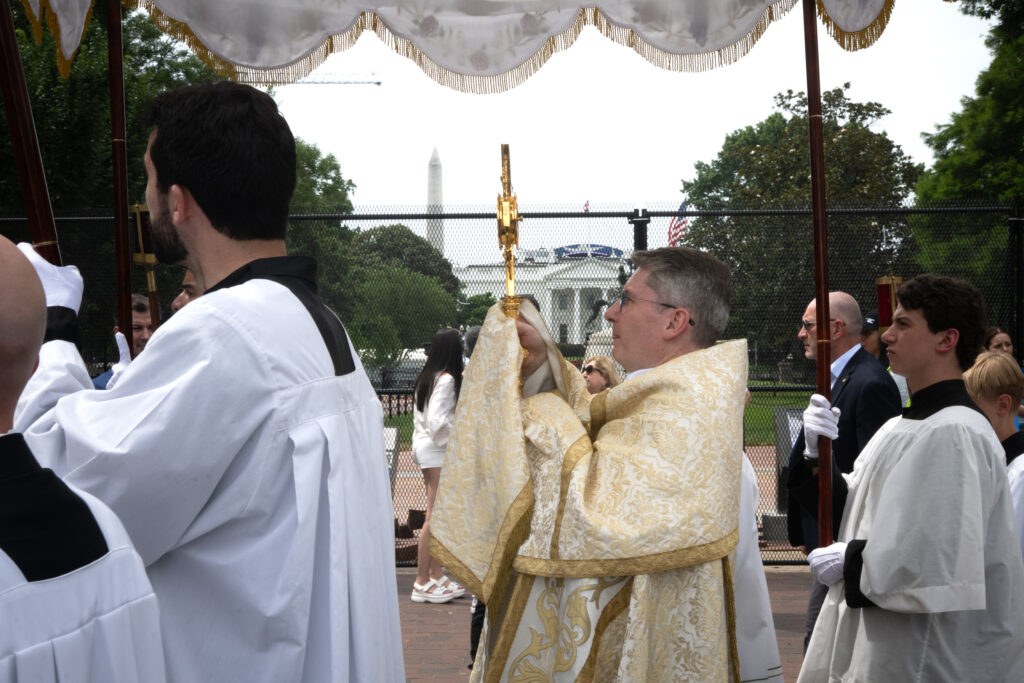The Blessed Sacrament is elevated in a monstrance during a Eucharistic procession in Washington, D.C., just outside of the White House, June 6, 2026. Approximately 1,000 pilgrims processed through downtown Washington carrying the Blessed Sacrament. | Credit: Jeff Bruno / EWTN News