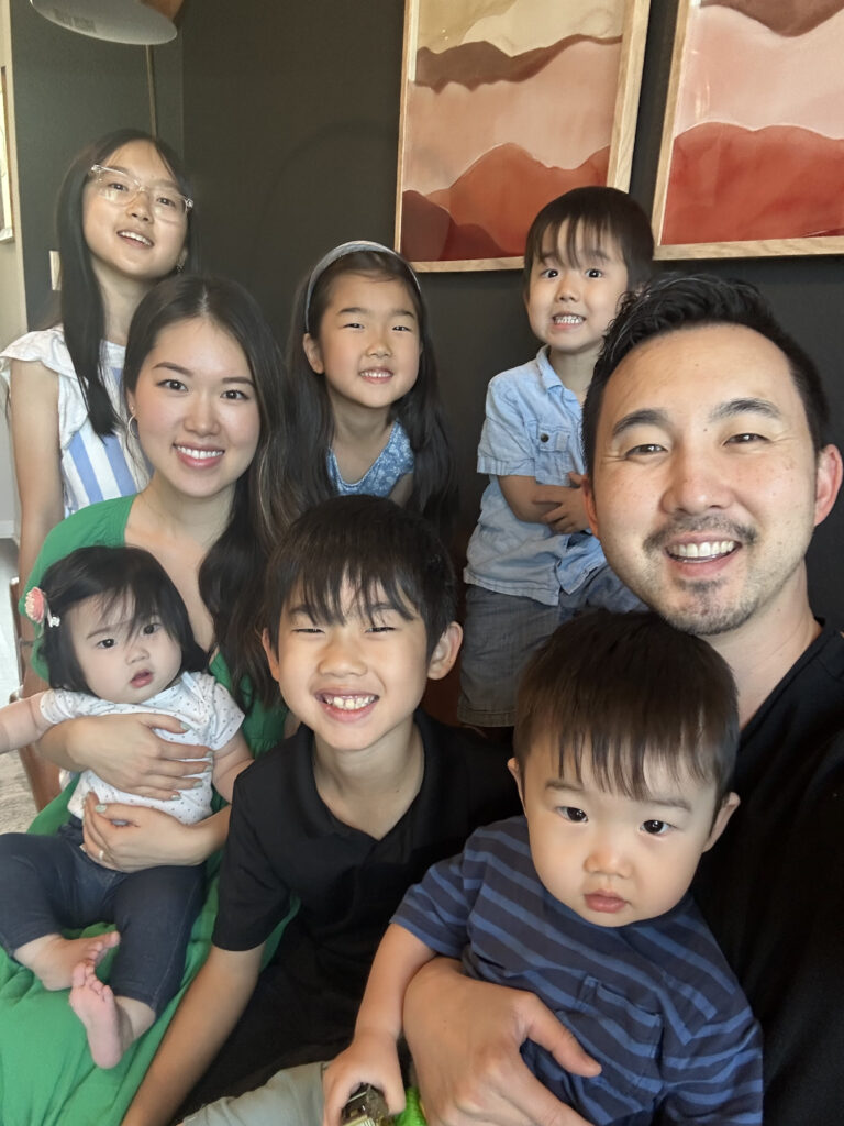 Paul J. Kim holds his son Micah in a family photo with his wife and the entire Kim family. Micah passed away after the world kept vigil last December when the 5-year old was ill in the hospital.