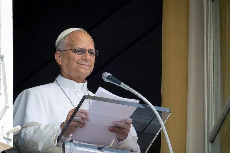 Pope Leo XIV addresses pilgrims gathered in St. Peter's Square at the Vatican for the recitation of the Angelus on Aug. 2.