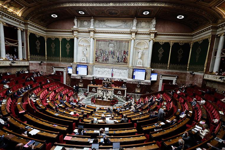 Les Democrates’ member of Parliament (MP) and rapporteur Philippe Vigier addresses MPs during the exam session of the vote on the assisted dying bill at the National Assembly, France’s lower house of Parliament, in Paris on July 15, 2026. The bill passed, allowing for assisted suicide.