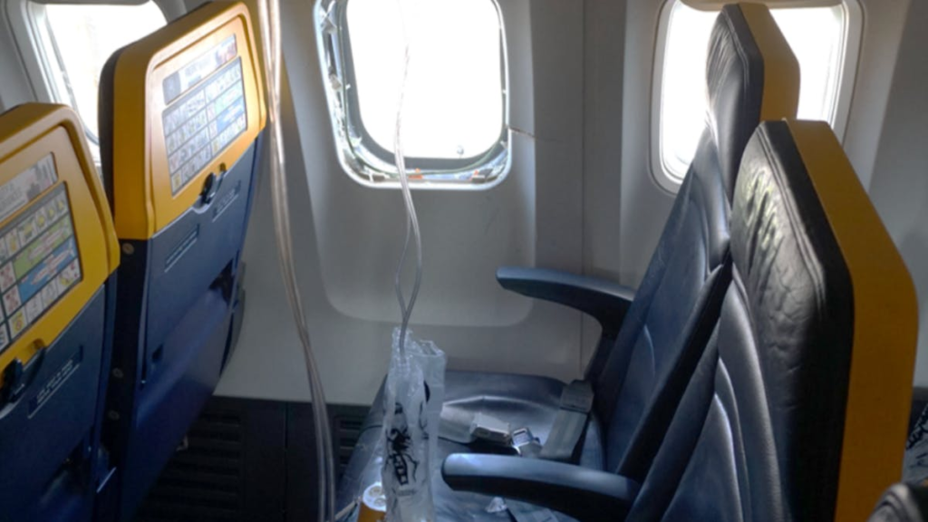 Passenger Saved From Getting Sucked Out Of Plane After Midair Disaster