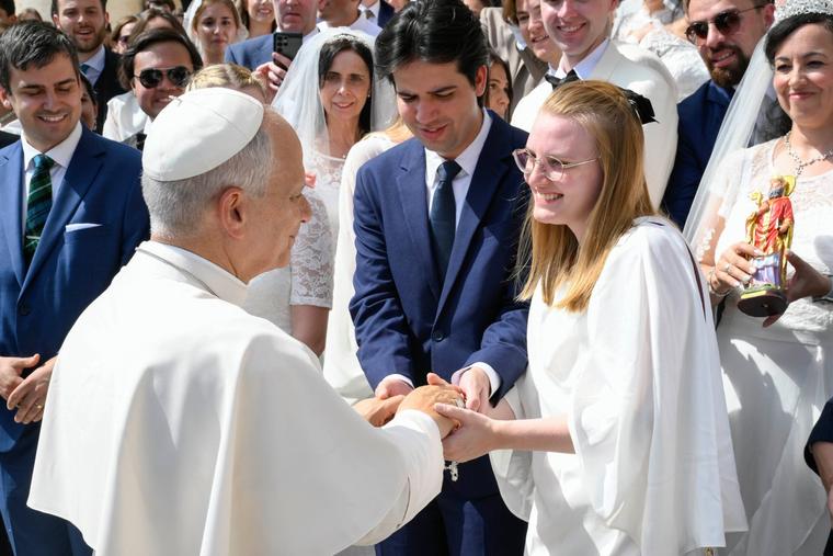 Pope Leo XIV greets couples gathered in St. Peter’s Square during the Sept. 9, 2026, general audience.